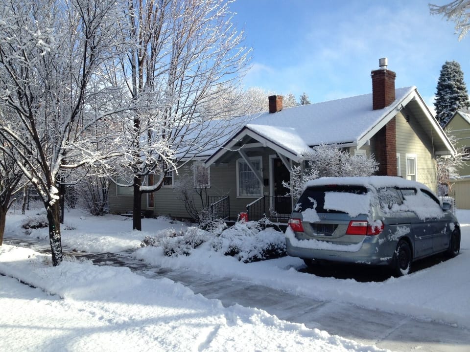 Fresh winter snow on our quiet street: on- and off-street parking available