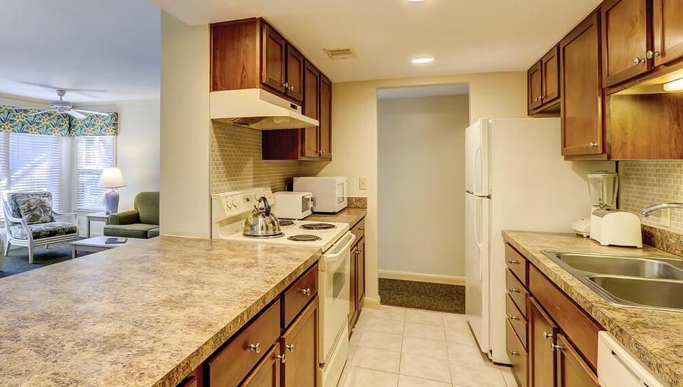 Cook with ease in the fully equipped, open kitchen.