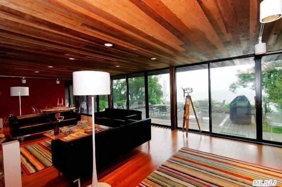 The Living Room - view 2 with beautiful redwood ceilings - overlooking the Sound
