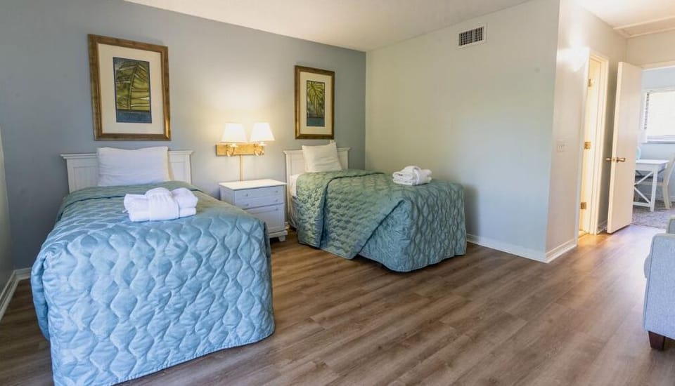 Settle in comfortably with crisp linens and calming tones.