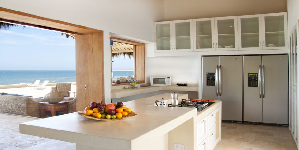 Kitchen with full views of the ocean.