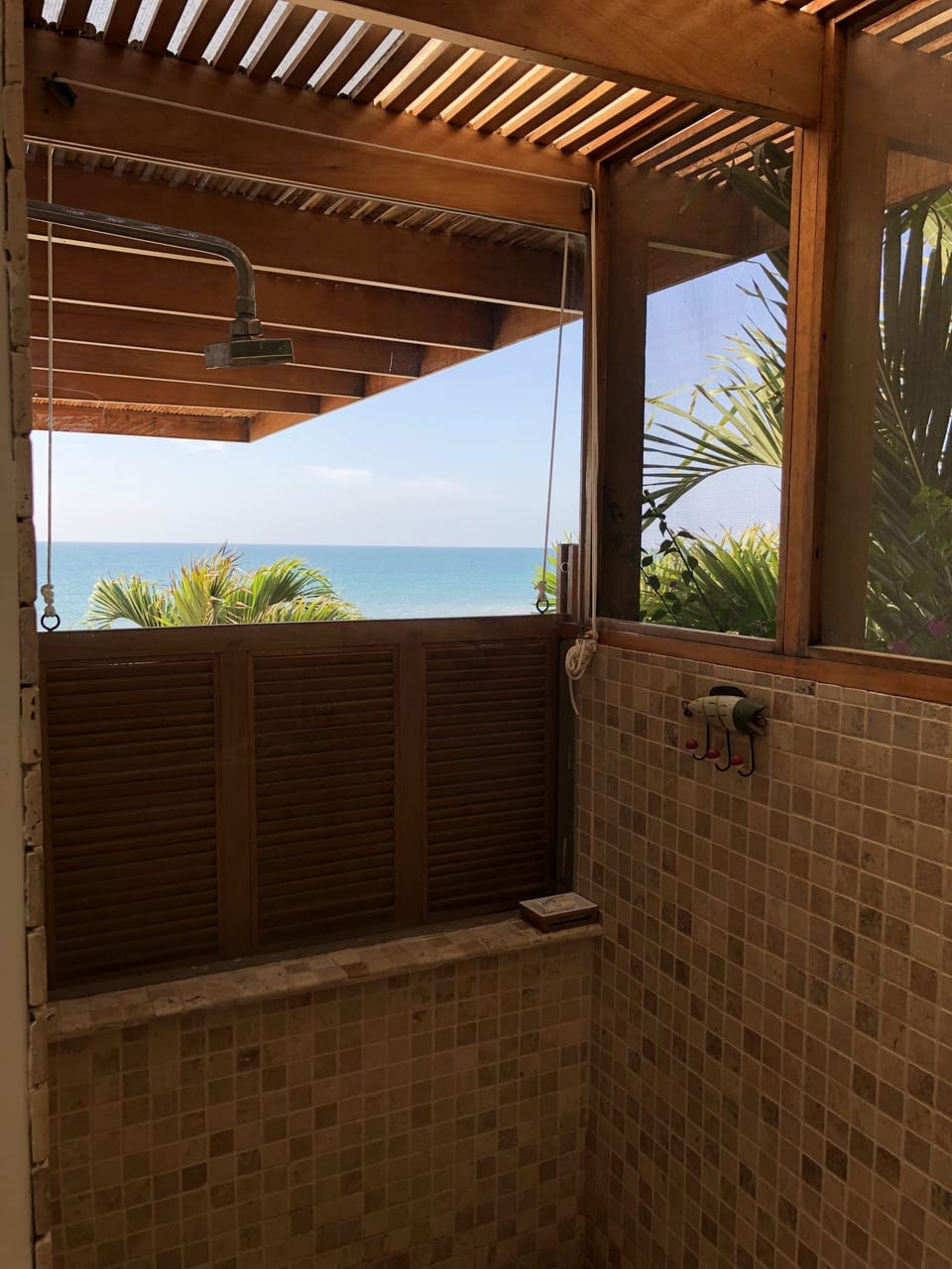 Ocean view from shower in bathroom of master suite upstairs. 