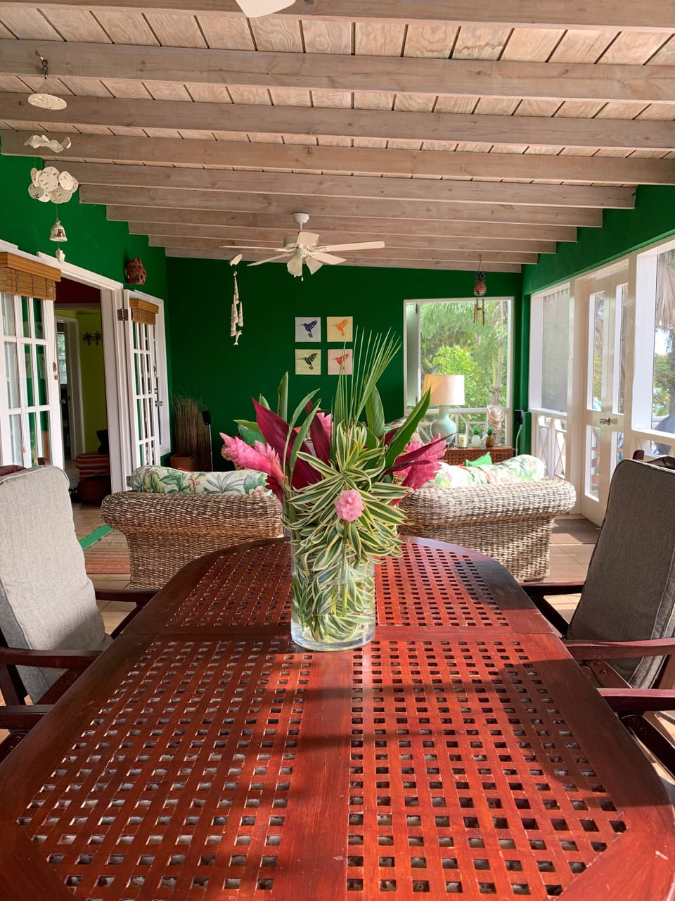Front verandah - covered outdoor dining and seating (fully screened)