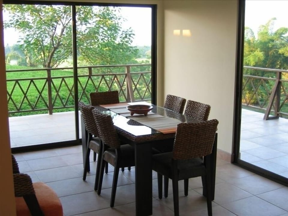 A Dining Area with unobstructed views of the Ocean.