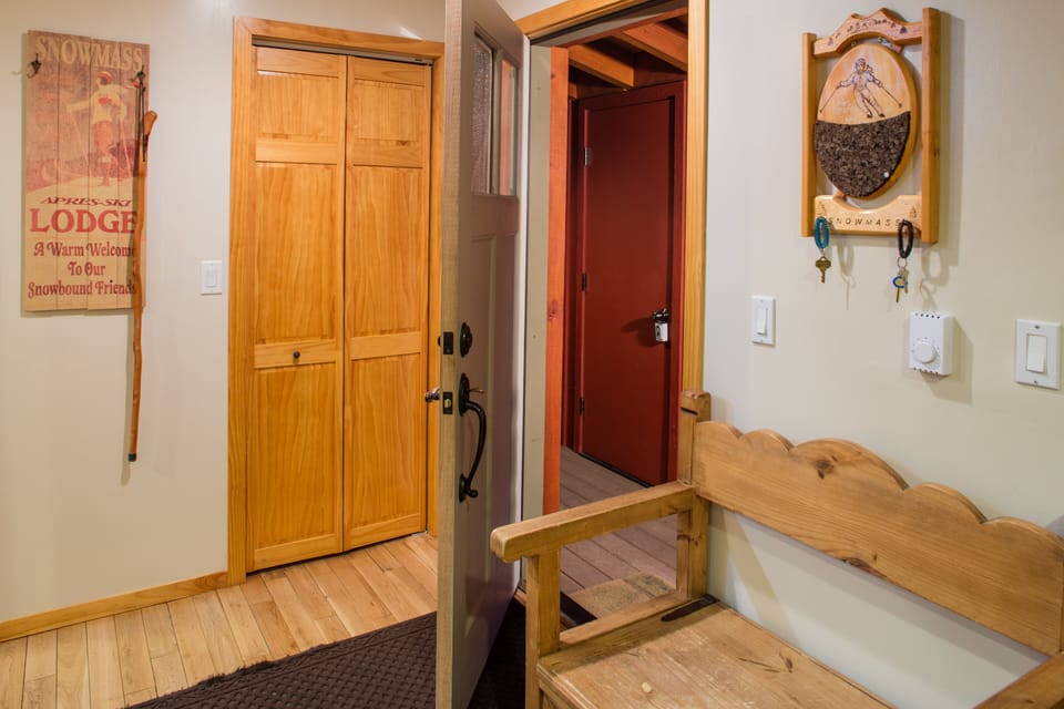 Open entry way with storage closed inside and out.
