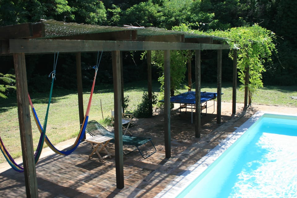 In the shade of the pergola