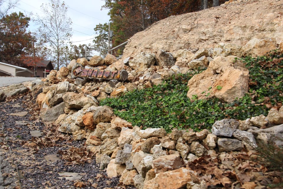 Our Name Sign Right at Entrance of Driveway
