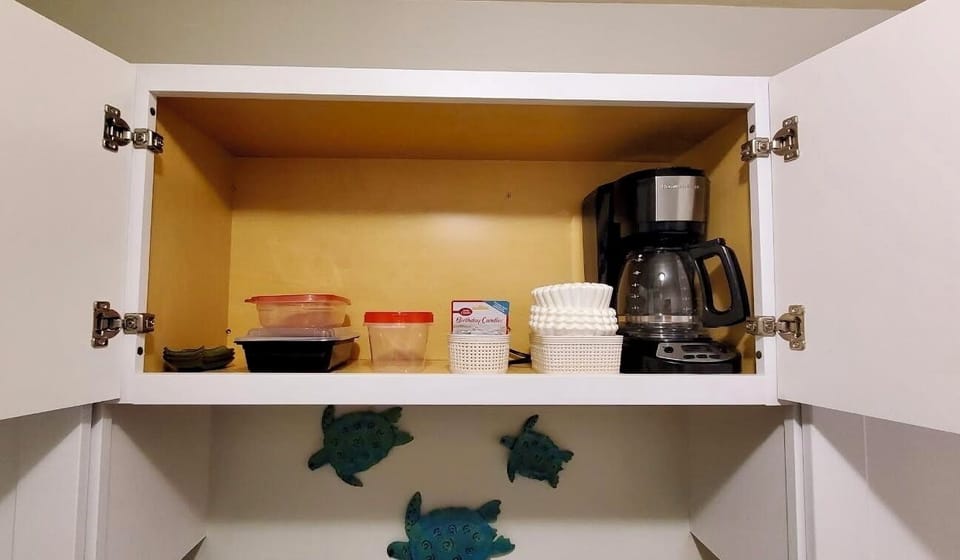 For those bringing their own coffee to brew,  a coffee pot is above the sink!