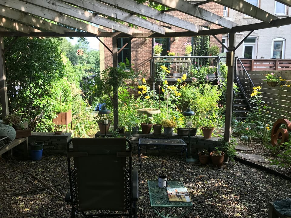 Relax or dine under the pergola in private garden
