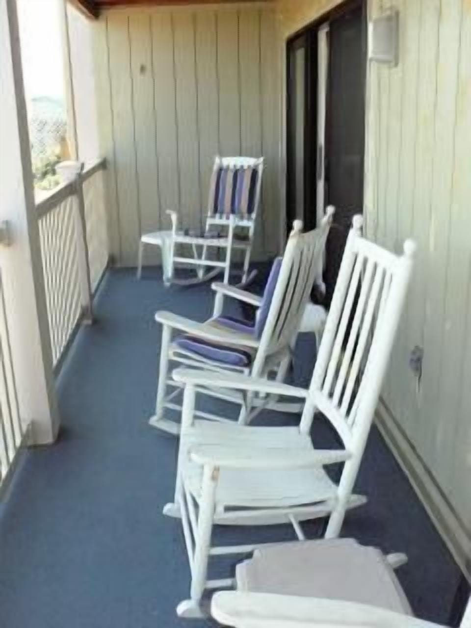 Porch on oceanside has four rockers.  New carpet in 2024!