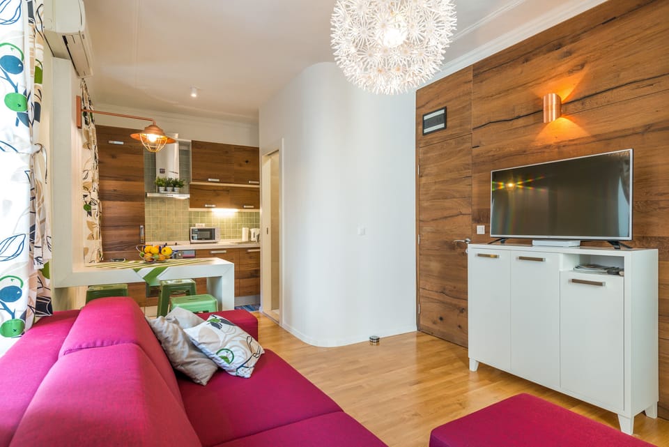 Living room with dining place and kitchen I