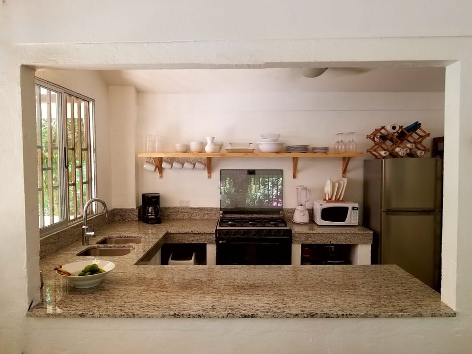 Granite counter tops and stainless steel appliances. Gas stove