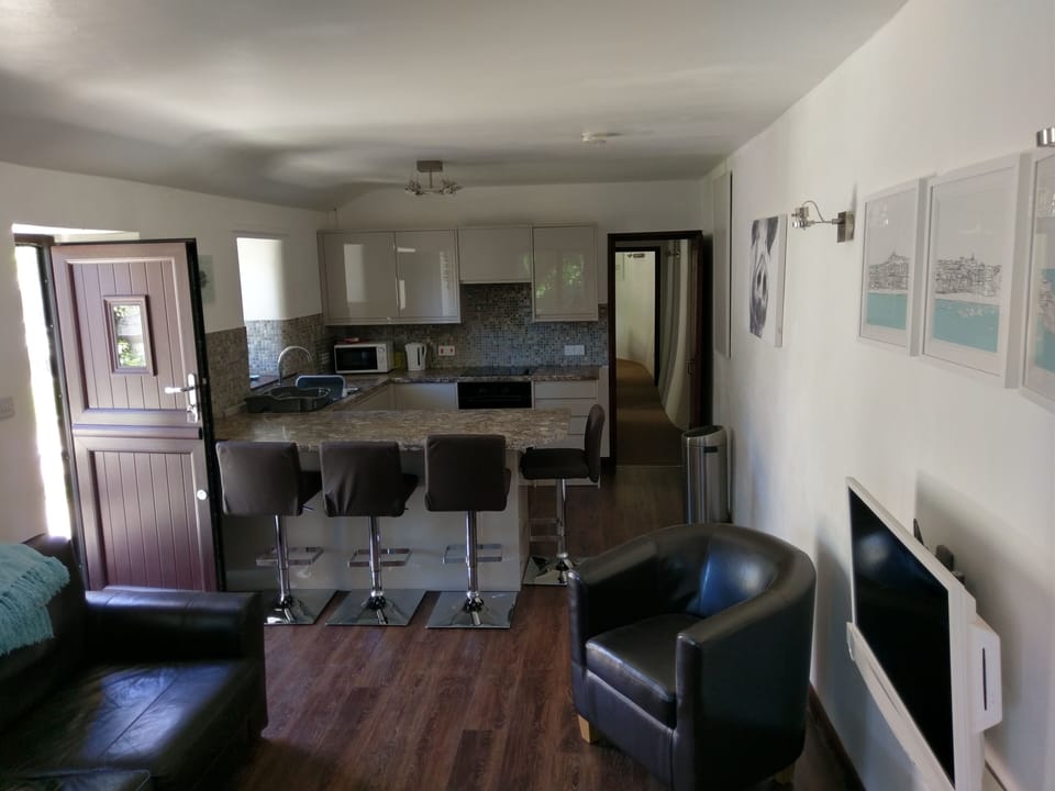 Lounge showing stable door to barn.