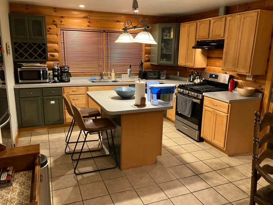 Kitchen has ample space for cooks, very well-equipped by rental standards