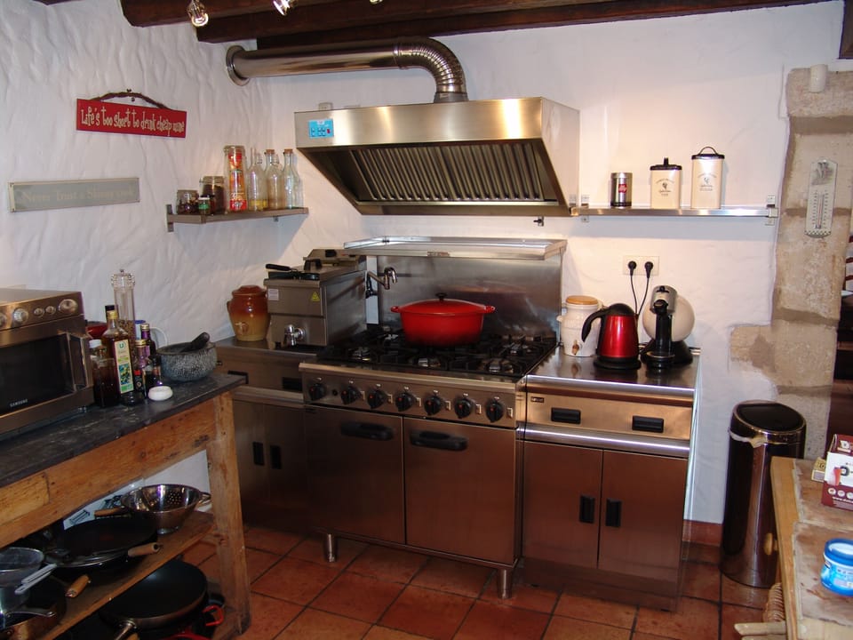 Catering grade gas over, hob and extractor