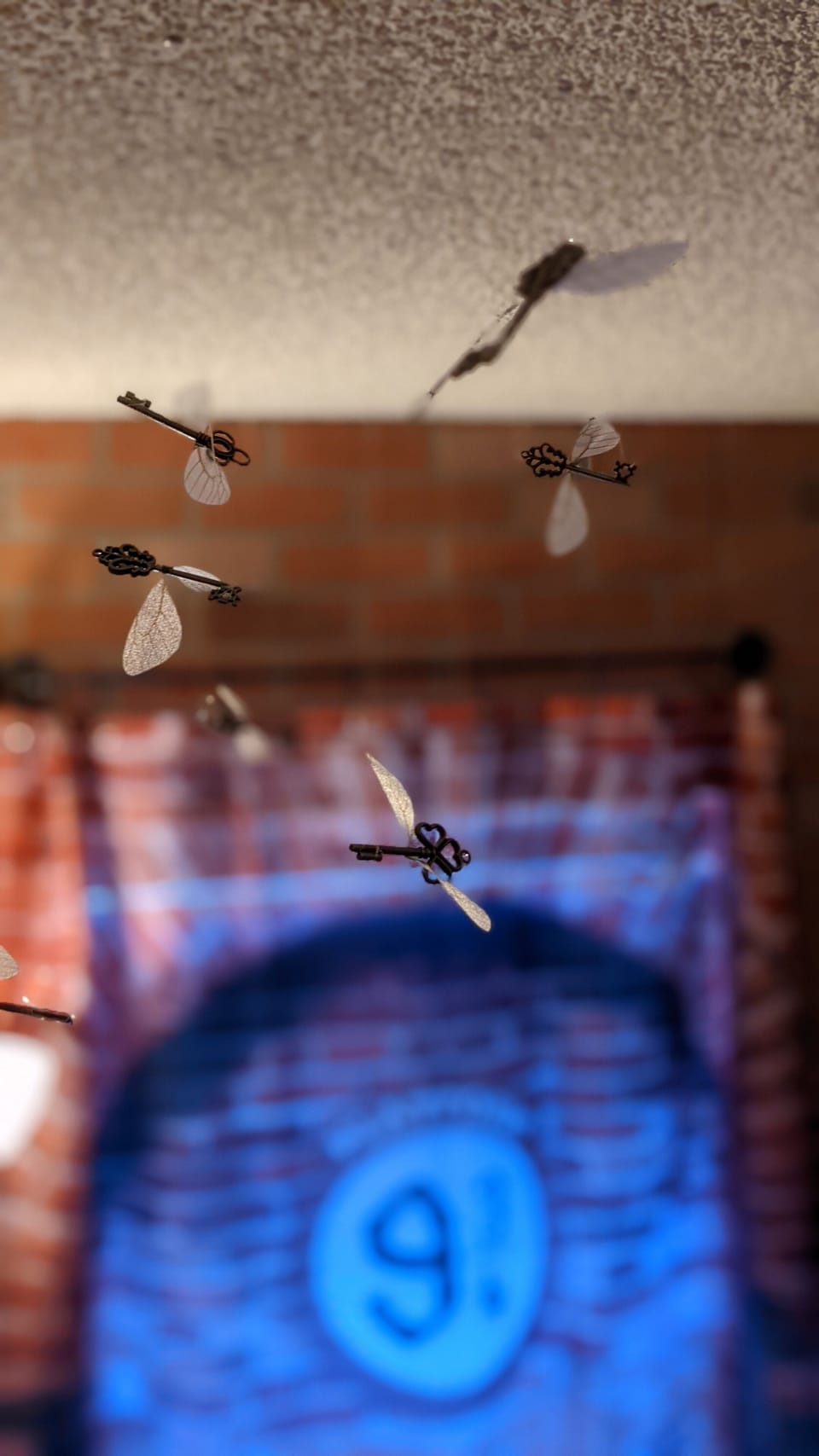 Flying keys descend from the ceiling.