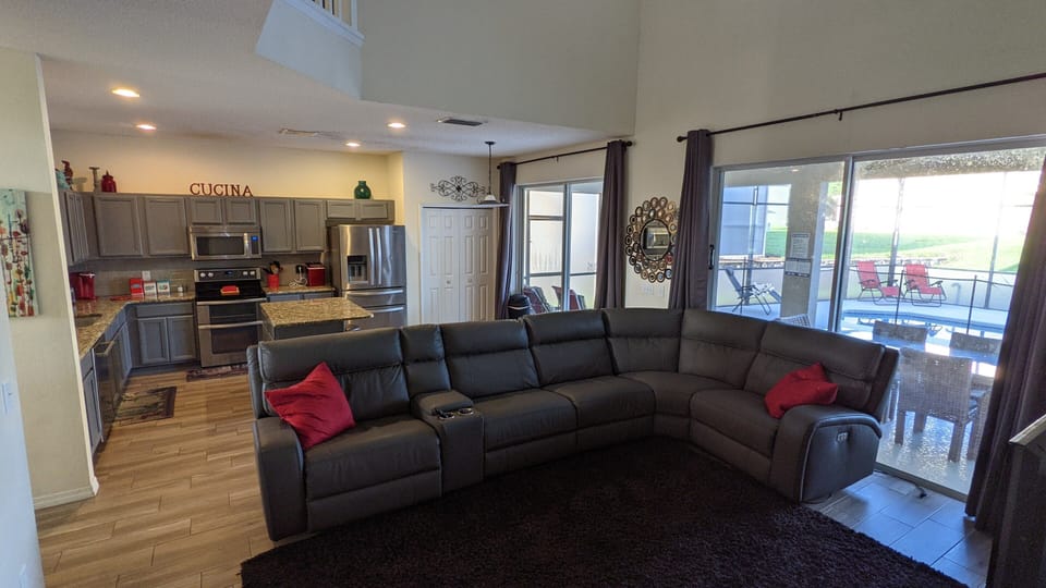 Kitchen, living room and pool deck. You will make lots of fun memories here.