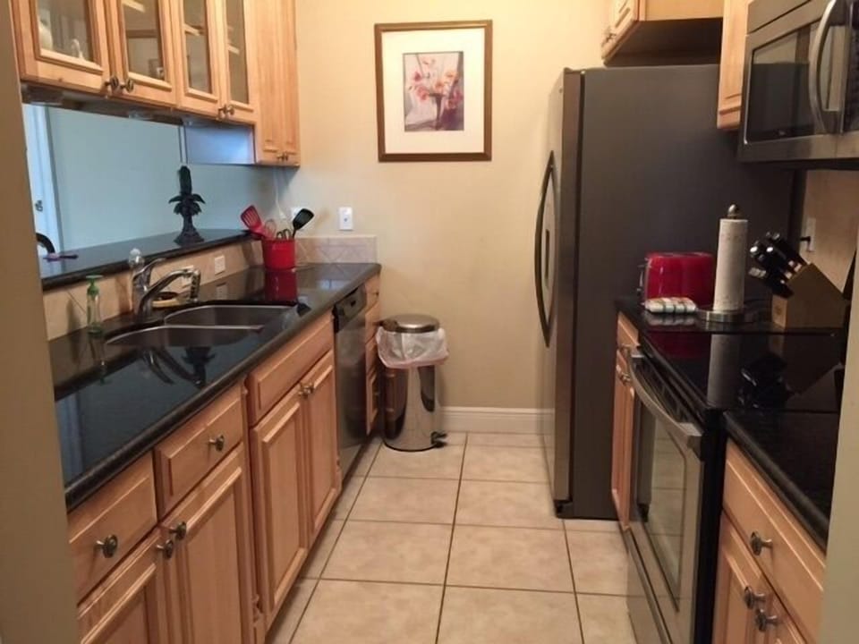 Kitchen with granite counter tops.