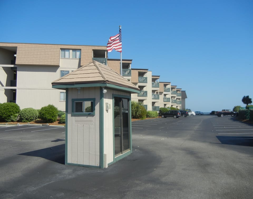 Welcome!  parking lot entrance guard shack