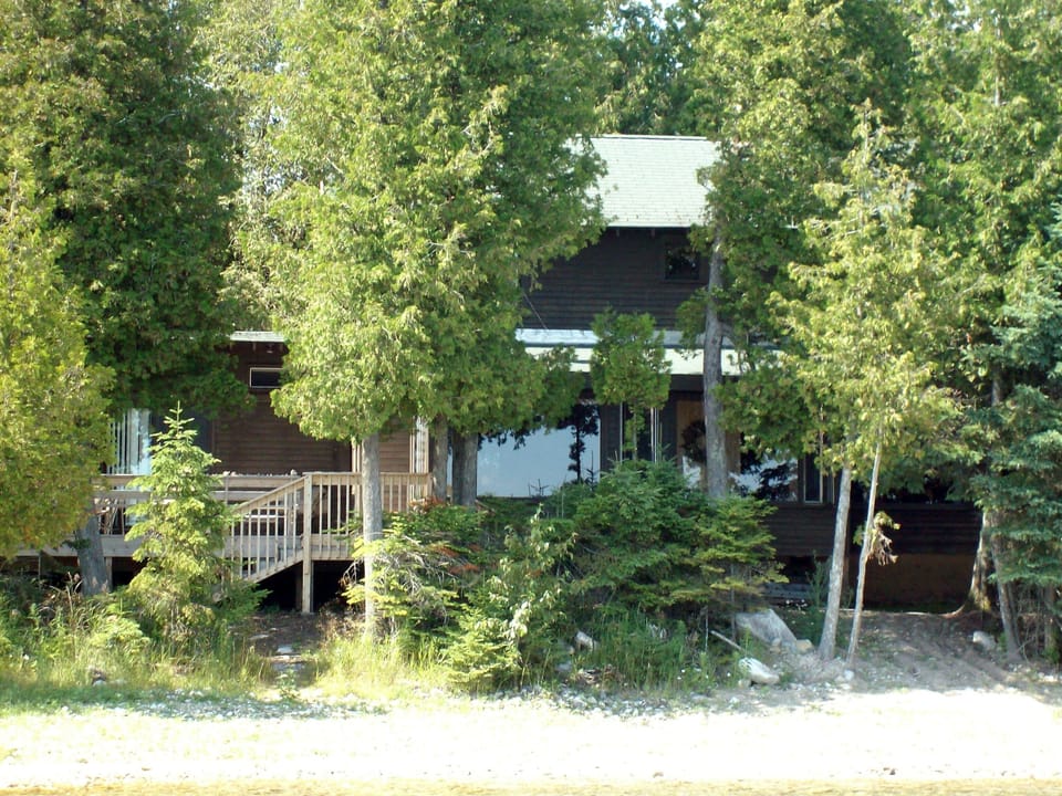 Front of 2 story home on Surgeons Island taken from water