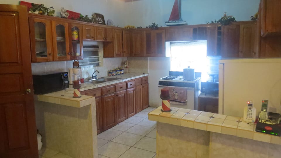 Large fully equipped kitchen.