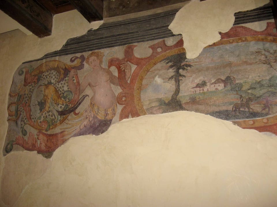 Original frescos on stair walls