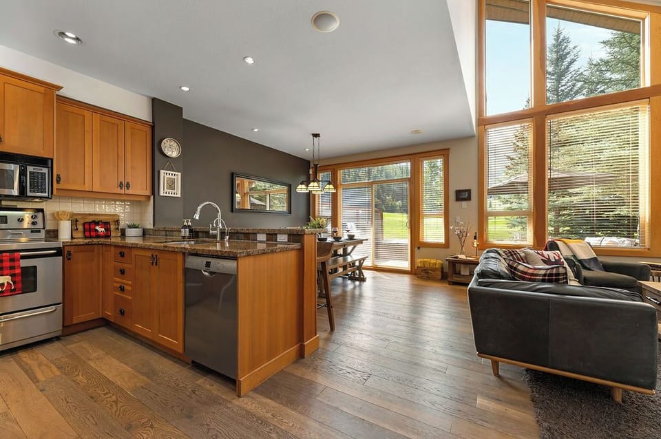 Bright and open spaces from kitchen to dining room to the outdoor deck.