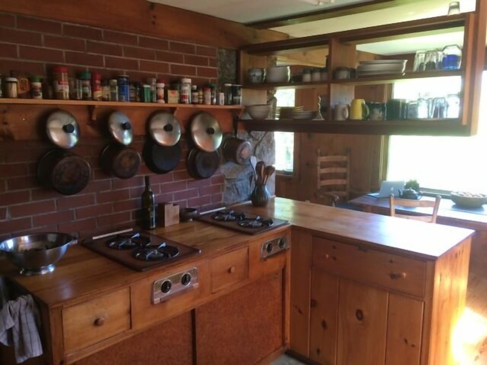 Kitchen and dining table in front of picture window