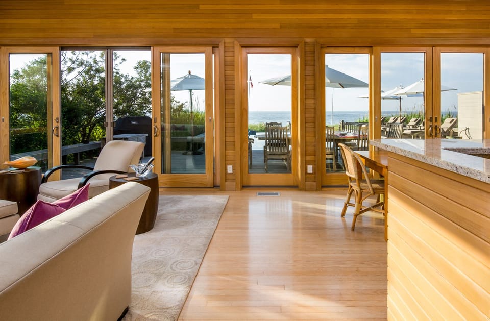 Living Area with Sliding doors to Pool and Bay Views