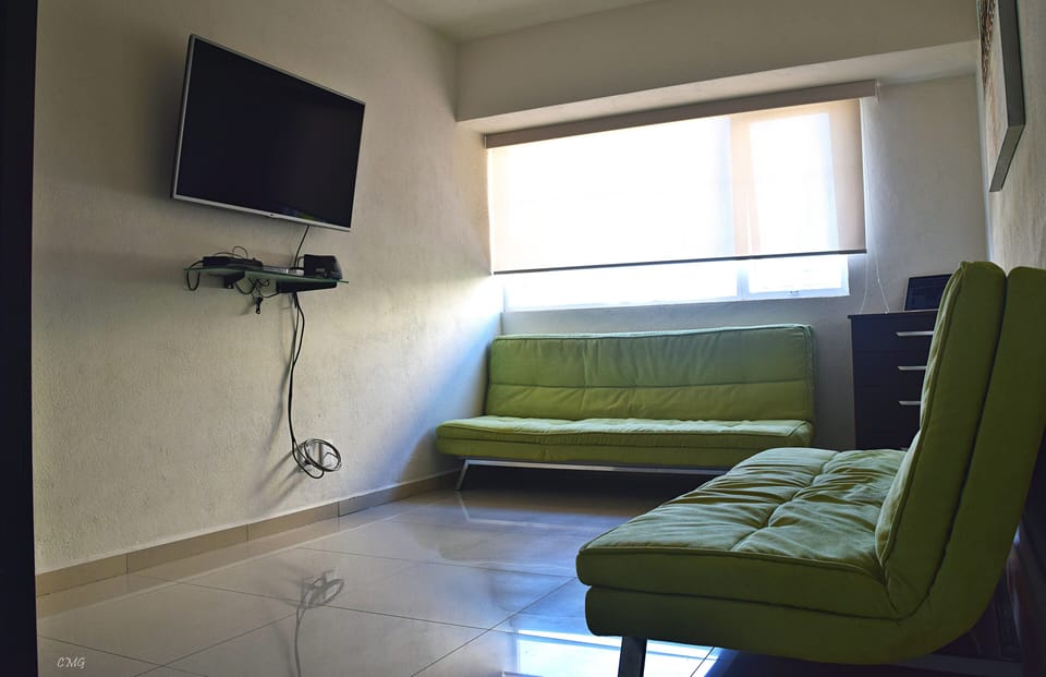 TV Hall with 2 sofa beds and wireless internet for all the property