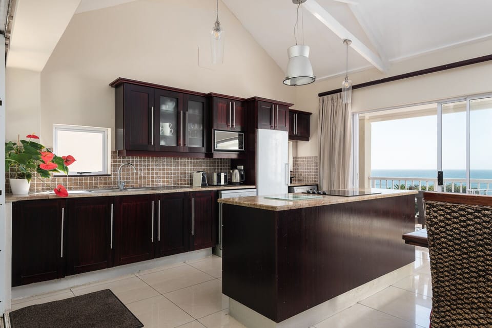 Kitchen with sea views