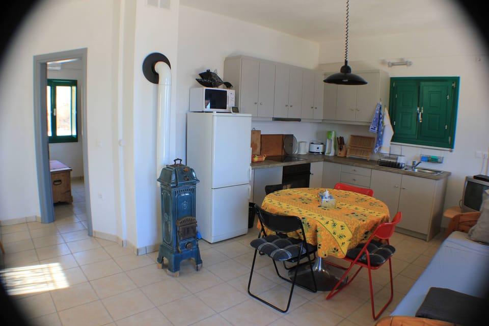 Fully equipped kitchen and old nameled stove