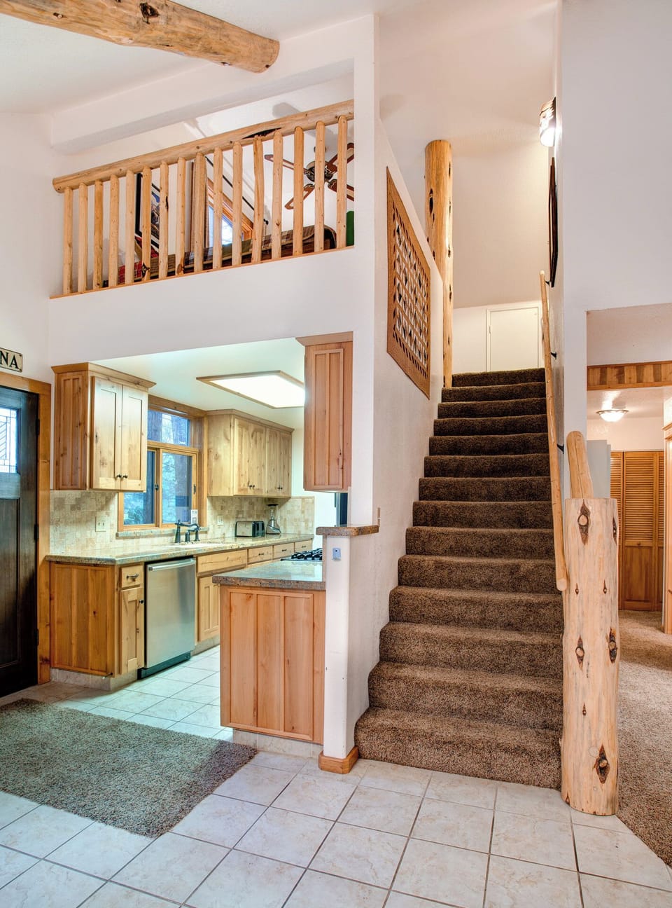 Stairway to loft and upper bedroom