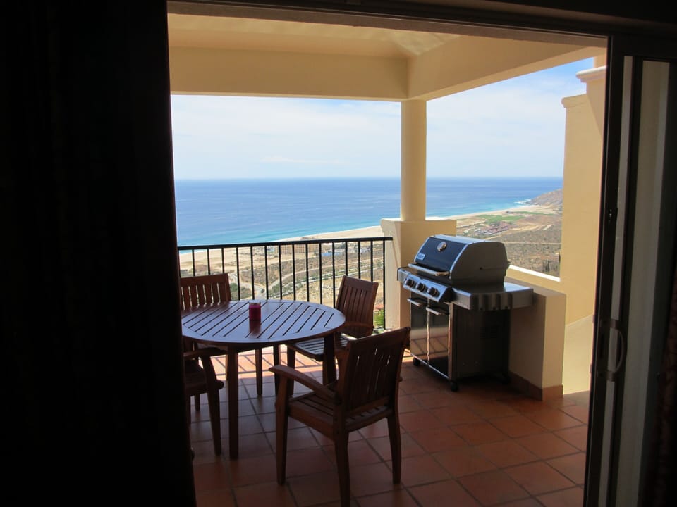 Brand new Weber grill on patio with ocean view