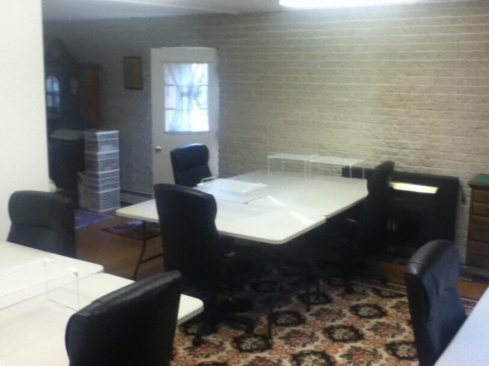 Crafting guests get 5' table, comfy chair+ vertical rack for extra work space