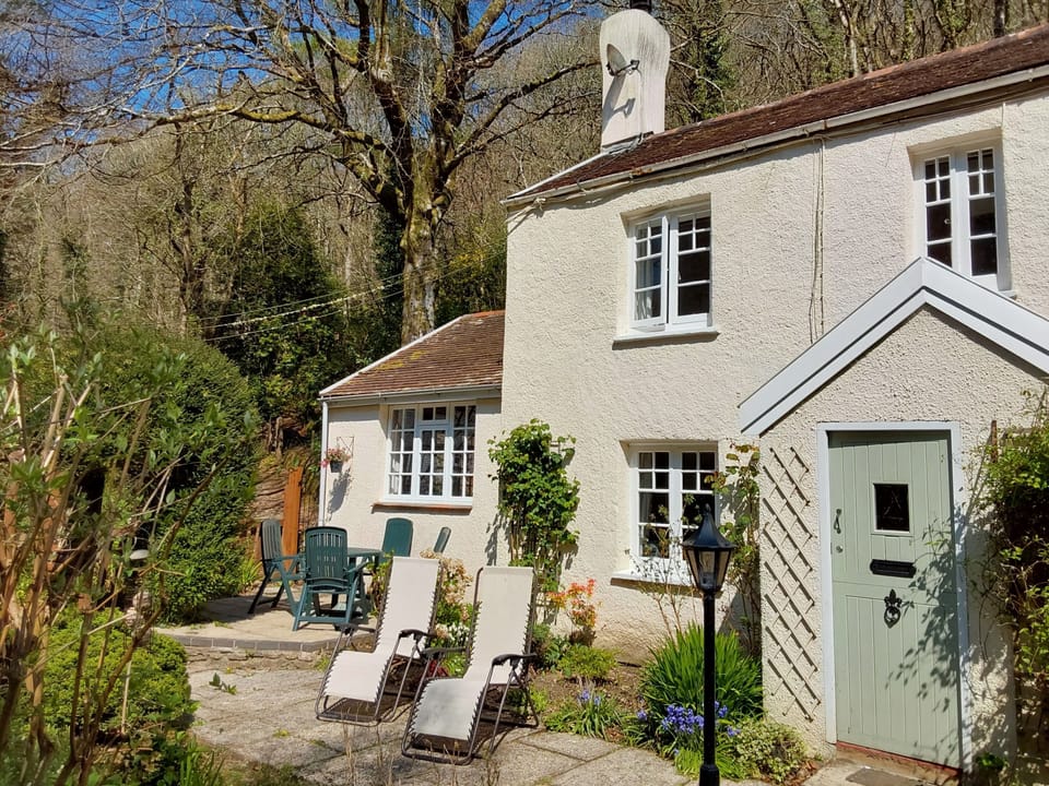 A perfect spot to sit and listen to the river tumbling past the cottage.