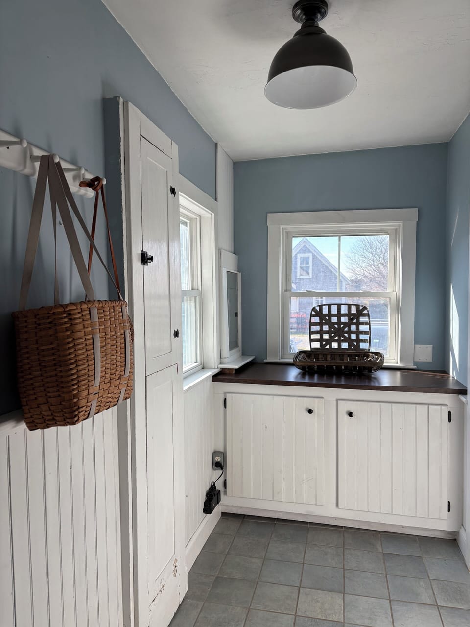 Hallway from the kitchen to the half bath/laundry.