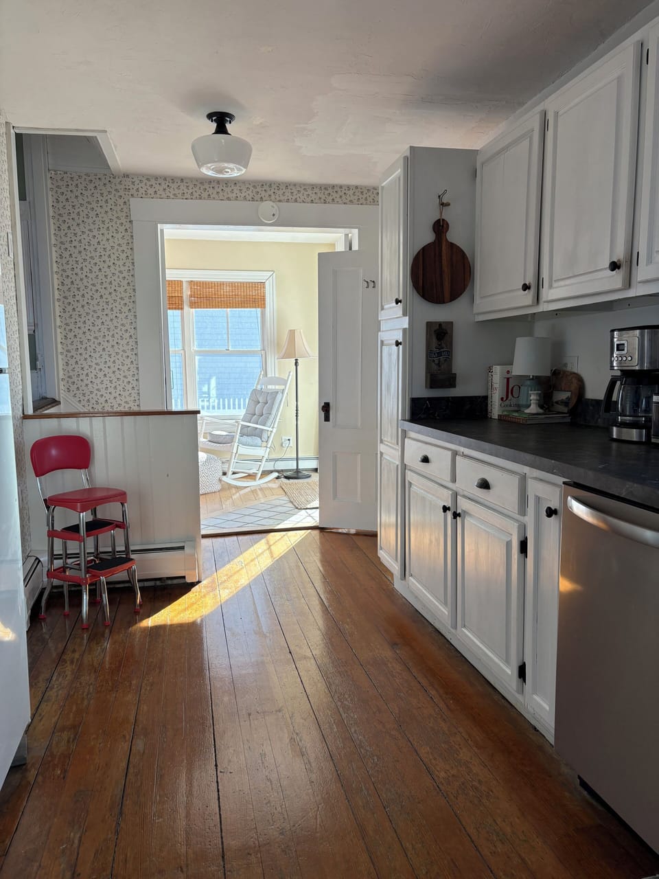 View into sunroom from the kitchen.