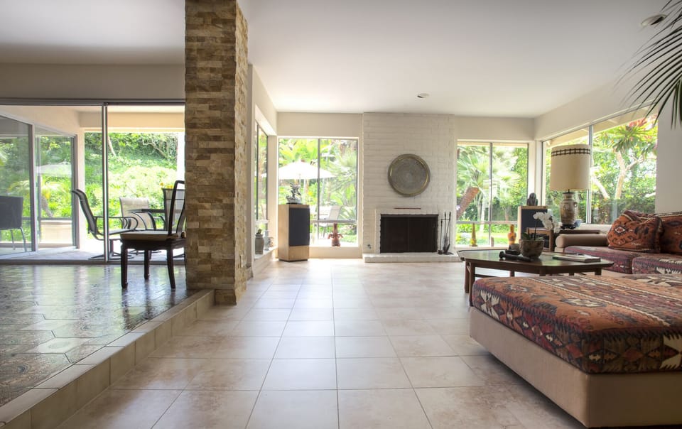 Living room and dining room with garden view
