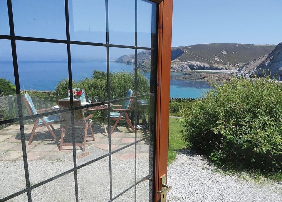 Door from Bedroom to Patio with uninterrupted views of the Cove