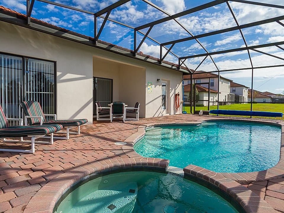 A view of the pool and the welcoming spa