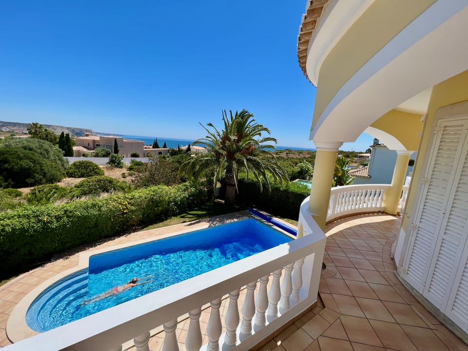 view to the sea and Black Rock in Luz