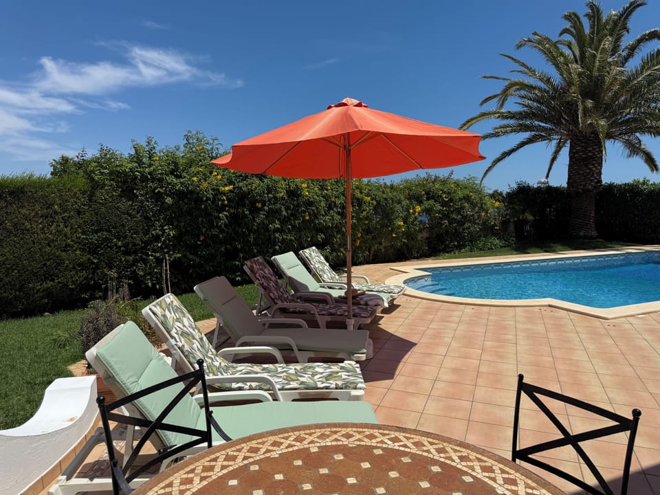Sunloungers by pool