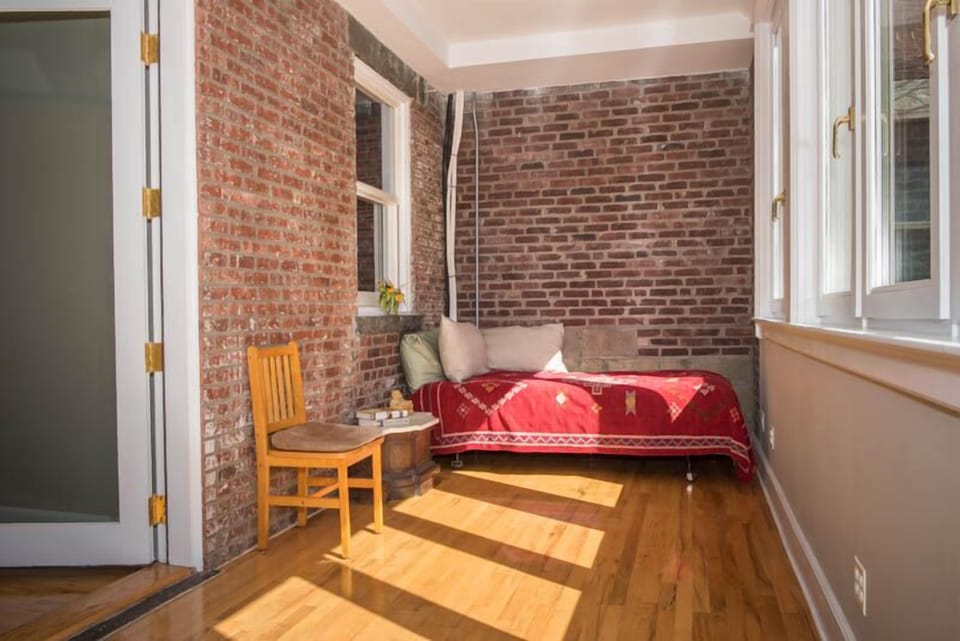 twin bed in sunroom