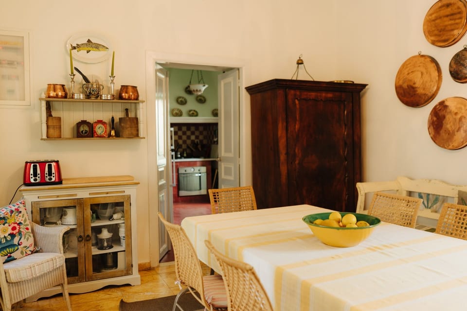 The dining room with seating for 8 leads onto the kitchen