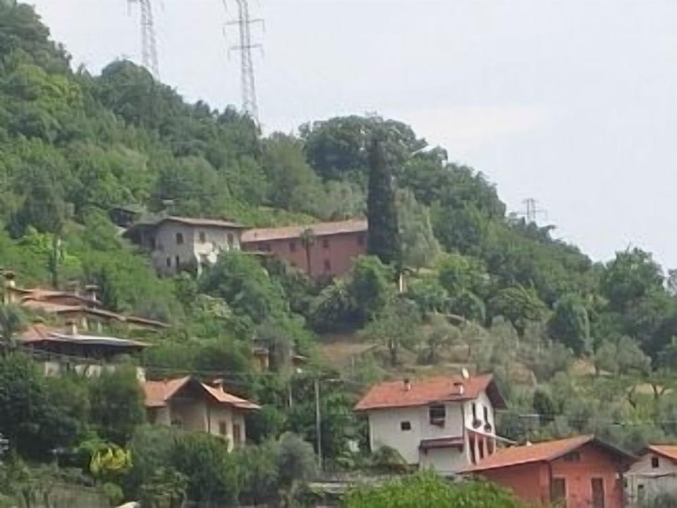 A view of Roveglio Cottage and Farmhouse