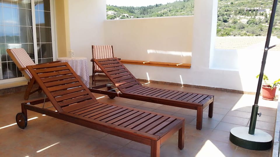 Veranda with sun loungers