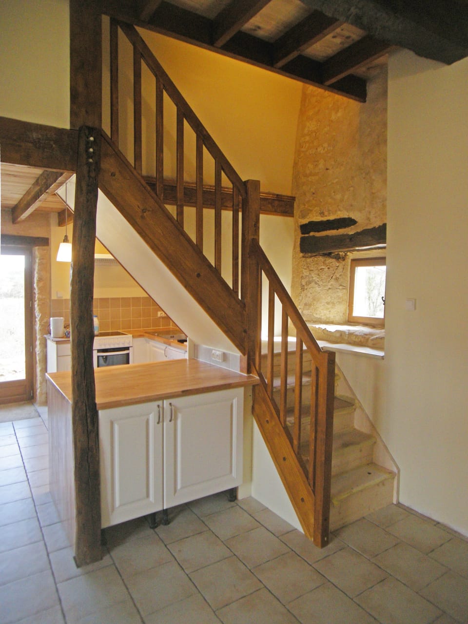 Stairs and view into kitchen