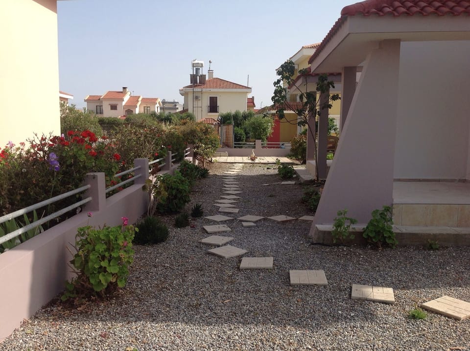 View from road down side of house