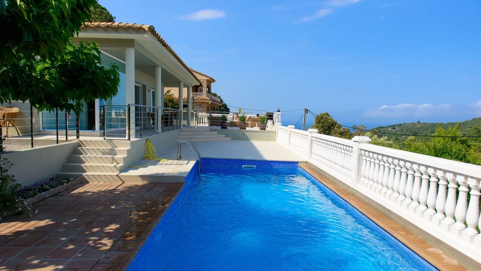 The pool is regularly maintained and there is a railing and gate for child safety